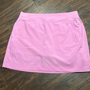 Women’s pink skirt, athletic size extra-large, 18 across 18 down side pocket